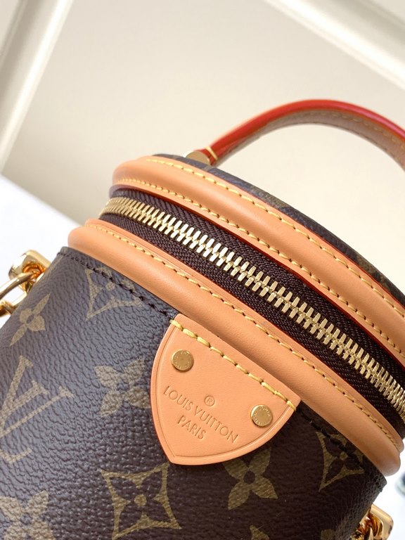 Top of the line [Exclusive M82952 】The Nano Cannes bag is cut from Monogram canvas in a cylindrical shape that mirrors the design of the cosmetic bag. Leather trims and the Louis Vuitton logo embossed on the label enrich