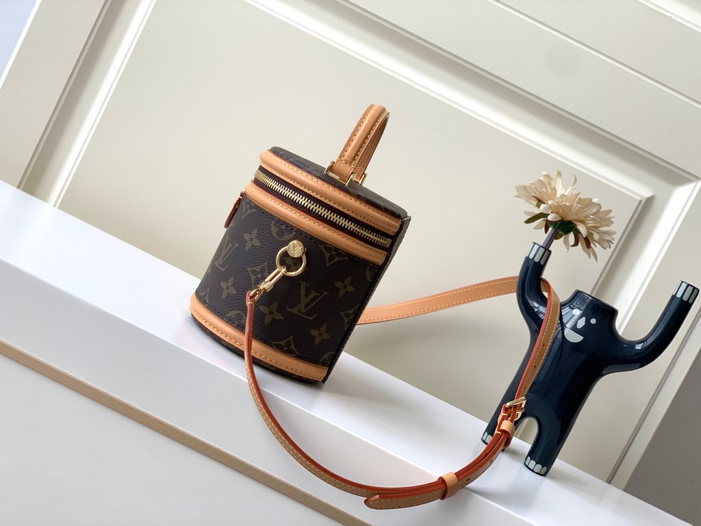 Top of the line [Exclusive M82952 】The Nano Cannes bag is cut from Monogram canvas in a cylindrical shape that mirrors the design of the cosmetic bag. Leather trims and the Louis Vuitton logo embossed on the label enrich