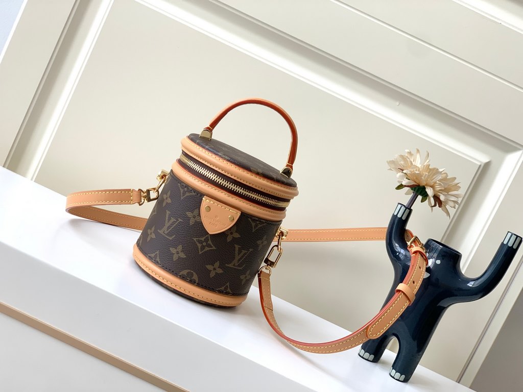 Top of the line [Exclusive M82952 】The Nano Cannes bag is cut from Monogram canvas in a cylindrical shape that mirrors the design of the cosmetic bag. Leather trims and the Louis Vuitton logo embossed on the label enrich