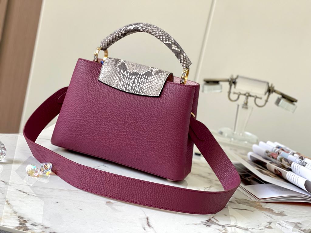 PremiumN82068 Grape Purple with Parisian Pink Python and Gold Buckle].In grained Taurillon leather with python flap, top handle and LV monogram, this Capucines BB bag has a luxurious feel. The contrasting light-colored l