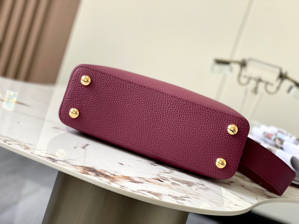 PremiumN82068 Grape Purple with Parisian Pink Python and Gold Buckle].In grained Taurillon leather with python flap, top handle and LV monogram, this Capucines BB bag has a luxurious feel. The contrasting light-colored l