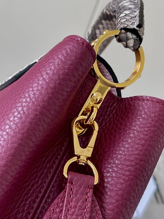 PremiumN82068 Grape Purple with Parisian Pink Python and Gold Buckle].In grained Taurillon leather with python flap, top handle and LV monogram, this Capucines BB bag has a luxurious feel. The contrasting light-colored l