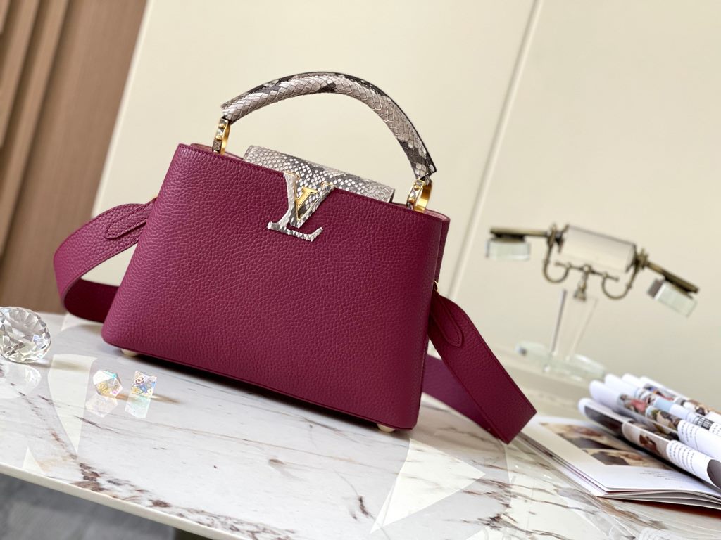 PremiumN82068 Grape Purple with Parisian Pink Python and Gold Buckle].In grained Taurillon leather with python flap, top handle and LV monogram, this Capucines BB bag has a luxurious feel. The contrasting light-colored l