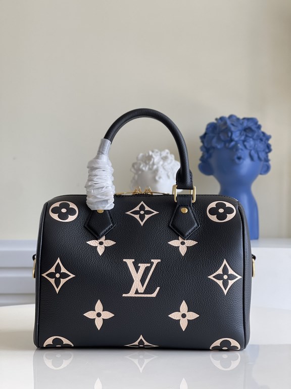 Exclusive to M58947] The Speedy Bandoulière 25 bag from the Fall 2021 Wild at Heart capsule collection features oversized LV letters embossed in Monogram Empreinte leather and a detachable shoulder strap for a crossbody 