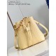 M22599 Yellow 22598g 】The NeoNoé BB bucket bag in supple cowhide leather is embossed with the Nano Monogram, a miniature version of the LV logo in a soft contrasting color to the Monogram floral pattern. The detachable c