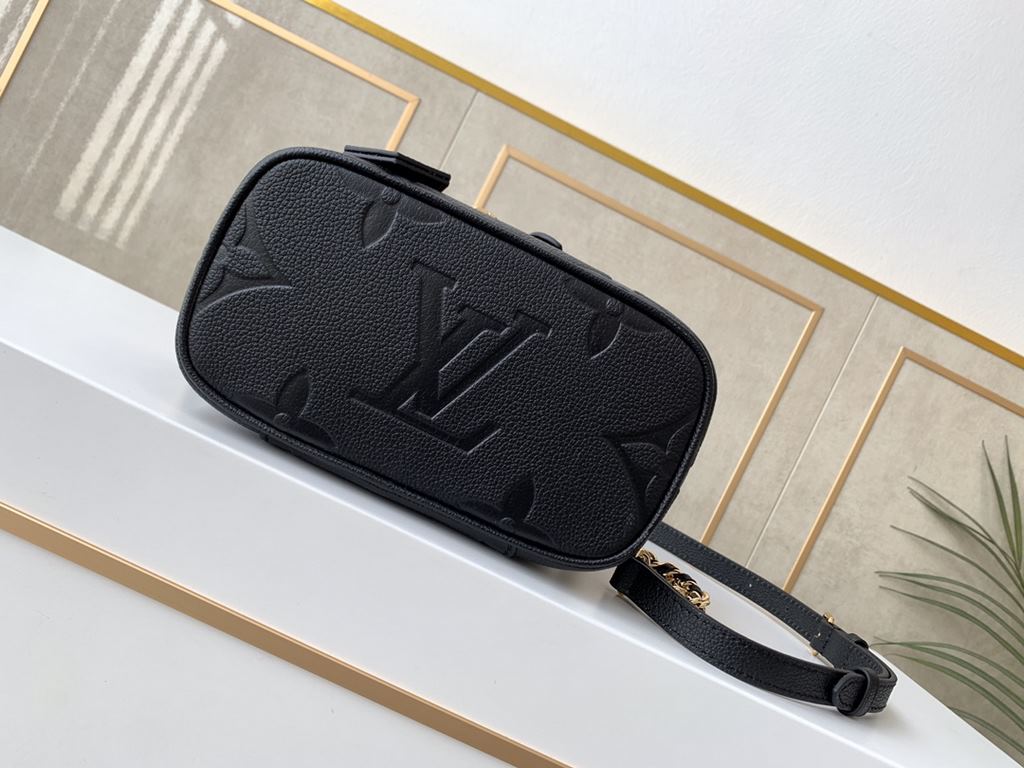 Top of the lineM45598 Black Embossed This small Vanity pouch combines Giant Monogram embossing, an elegant shape and leather top handles. Leather tassels open the zipper with ease, and a padlock keeps it secure. The deta