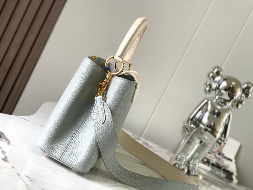 M59466 Minaret Gray with Pearl Platinum Clasp]A modern clash of shades in full-grain cowhide leather, this medium Capucines bag features the iconic LV alphabet and side loops, top handles and a detachable shoulder strap 