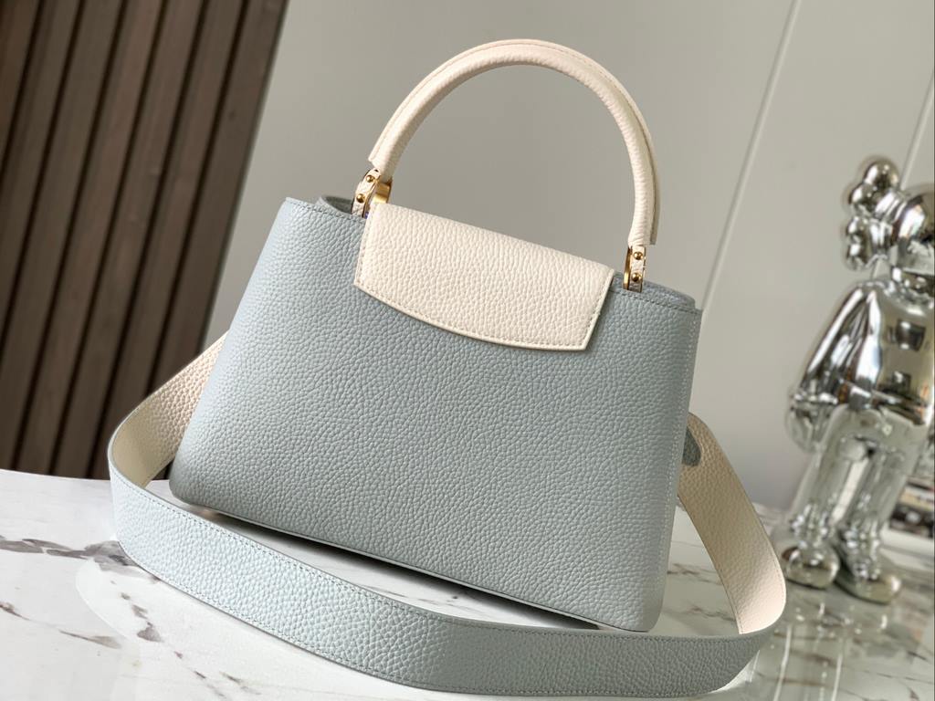 M59466 Minaret Gray with Pearl Platinum Clasp]A modern clash of shades in full-grain cowhide leather, this medium Capucines bag features the iconic LV alphabet and side loops, top handles and a detachable shoulder strap 