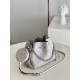 ExtraordinaryM58791 Pearlescent Gray] M57068 M57201 This Bella bucket bag is crafted from cutout cowhide leather with a metallic sheen that accentuates the perforated Monogram pattern. The sleek silhouette and round-neck