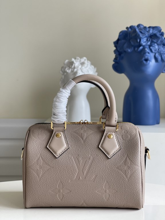 Exclusive M58953 Apricot] This Speedy Bandoulière 20 is a sleek and stylish way to carry your everyday essentials. Crafted from smooth Monogram Empreinte grained leather with oversized Monogram embossing, it features a p