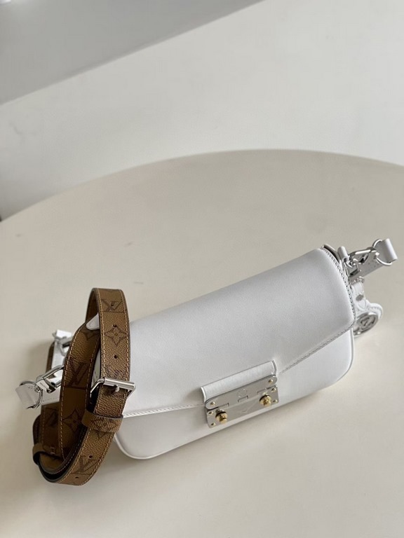 TopThe M20393 White Swing bag was unveiled on the SpringSummer 2022 runway, with a long and slender design based on the Louis Vuitton Pochette Métis bag. The classic S-lock closure extends its proportions, while the shor