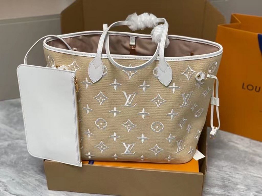 M22839White Woven Shopper Collection Neverfull MM Handbag Welcome the season with the sensuality of a calm vacation enjoyed at the beach with the Neverfull MM handbag shown in the new Bai the Pool collection. Soft cotton