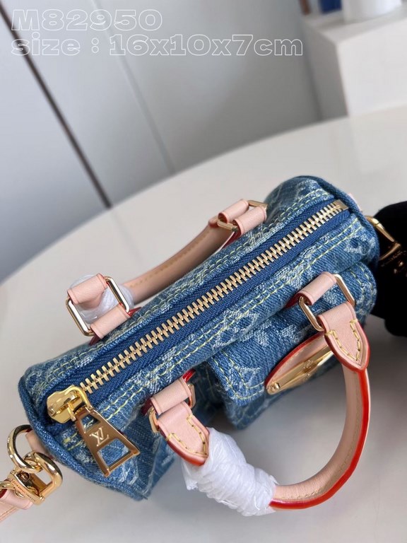 Exclusive to M82950] The Nano Speedy is made from Monogram Denim sandwashed canvas woven from certified cotton with leather handles and a detachable shoulder strap. The compact design features a slotted side pocket for a