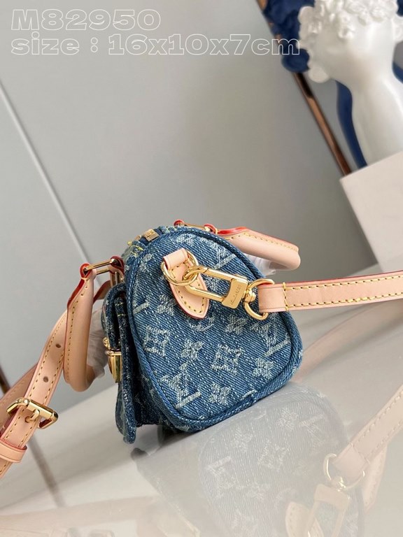 Exclusive to M82950] The Nano Speedy is made from Monogram Denim sandwashed canvas woven from certified cotton with leather handles and a detachable shoulder strap. The compact design features a slotted side pocket for a