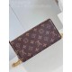 M82509 vintage 】Lily wallet on chain is made from Monogram canvas and combines a sleek rectangular shape with a subtle vintage look. Its flap features gold-tone panels, studs and the Louis Vuitton logo. Large enough to c