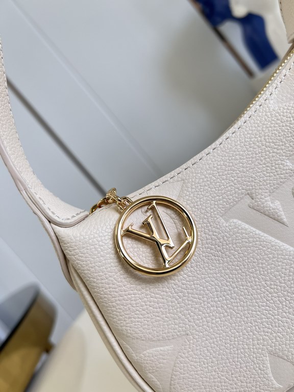 Exclusive M82391 White] The M82519 Mini Moon is crafted from supple Monogram Empreinte embossed leather, with eye-catching details such as the LV Circle logo on the zipper closure reflecting its jewel-like brilliance. Th