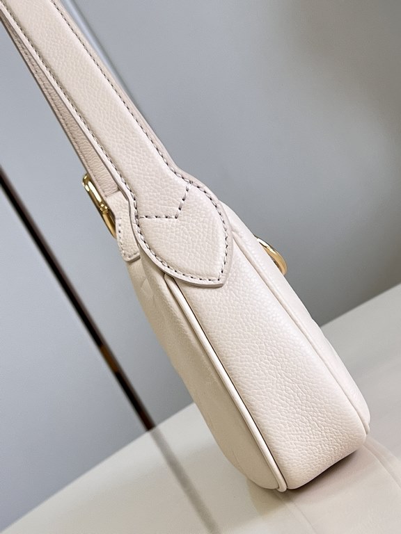 Exclusive M82391 White] The M82519 Mini Moon is crafted from supple Monogram Empreinte embossed leather, with eye-catching details such as the LV Circle logo on the zipper closure reflecting its jewel-like brilliance. Th