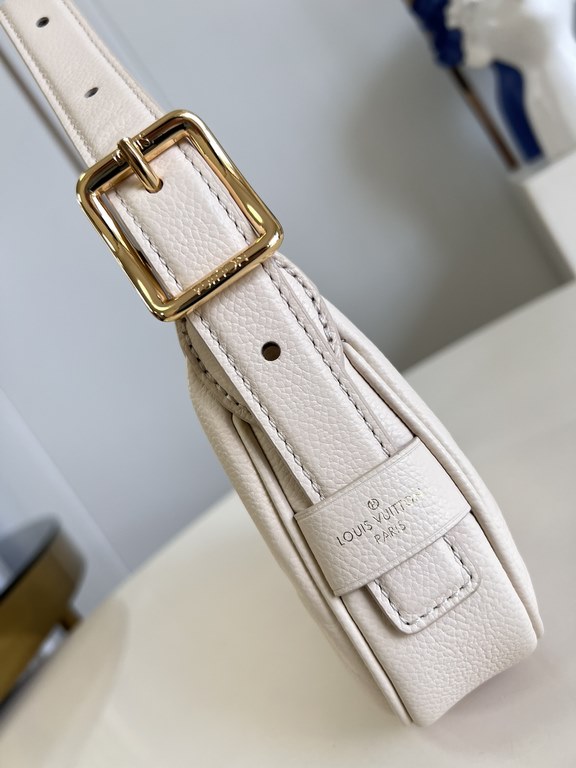 Exclusive M82391 White] The M82519 Mini Moon is crafted from supple Monogram Empreinte embossed leather, with eye-catching details such as the LV Circle logo on the zipper closure reflecting its jewel-like brilliance. Th