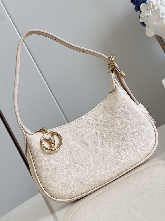 Exclusive M82391 White] The M82519 Mini Moon is crafted from supple Monogram Empreinte embossed leather, with eye-catching details such as the LV Circle logo on the zipper closure reflecting its jewel-like brilliance. Th