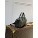 Top M57961 black full leather speedy KEEPALL XS handbag The Keepall XS handbag is a distillation of Louis Vuitton's classic Keepall travel bag design, with Monogram Seal cowhide reflecting the iconic Monogram embossing f