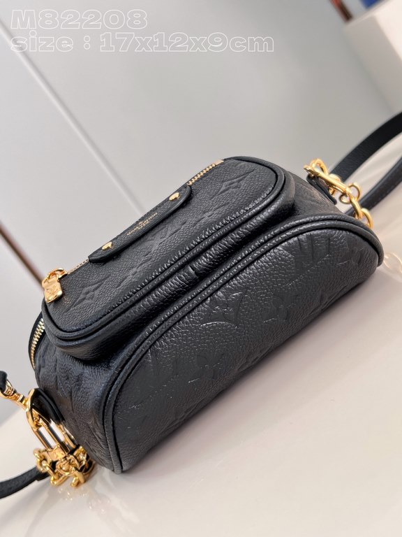 Exclusive M82208 Black Embossed] Louis Vuitton's soft take on the trendy fanny pack design, the Mini Bumbag is crafted from Monogram Empreinte leather and features a zippered main compartment and zippered pockets embelli