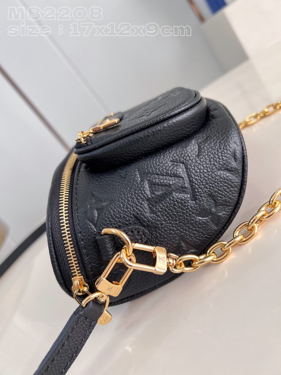 Exclusive M82208 Black Embossed] Louis Vuitton's soft take on the trendy fanny pack design, the Mini Bumbag is crafted from Monogram Empreinte leather and features a zippered main compartment and zippered pockets embelli