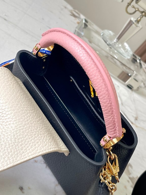 ExtraordinaryM20845 Black with Light Cherry Blossom Pink Floral TricotThis Capucines mini handbag is a soft and feminine piece a Taurillon leather body with a light-colored flap and top handle, and an enameled Monogram f