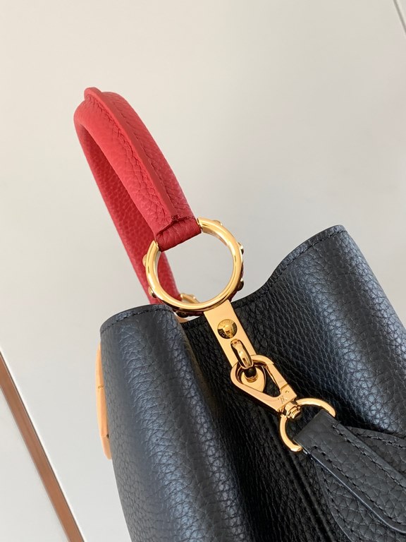 M59466 Black with Crimson Gold Buckle]A modern clash of shades in full-grain cowhide leather, this medium Capucines bag features the iconic LV alphabet and side loops, top handles and a detachable shoulder strap for vers