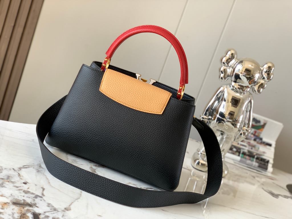 M59466 Black with Crimson Gold Buckle]A modern clash of shades in full-grain cowhide leather, this medium Capucines bag features the iconic LV alphabet and side loops, top handles and a detachable shoulder strap for vers