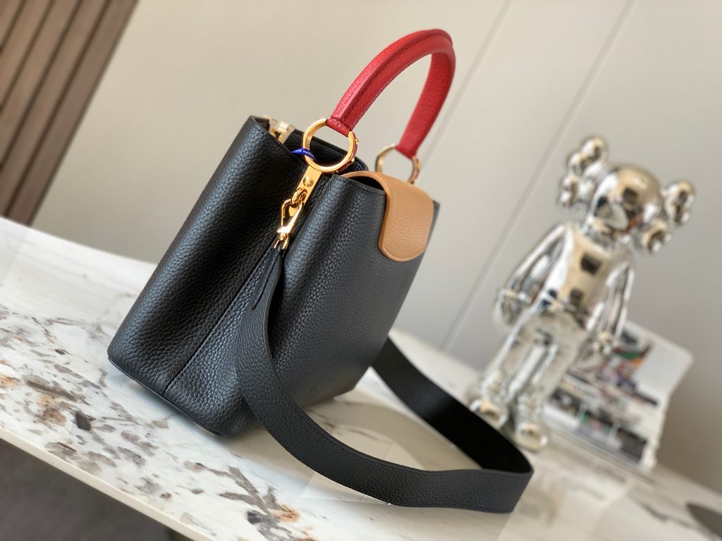 M59466 Black with Crimson Gold Buckle]A modern clash of shades in full-grain cowhide leather, this medium Capucines bag features the iconic LV alphabet and side loops, top handles and a detachable shoulder strap for vers