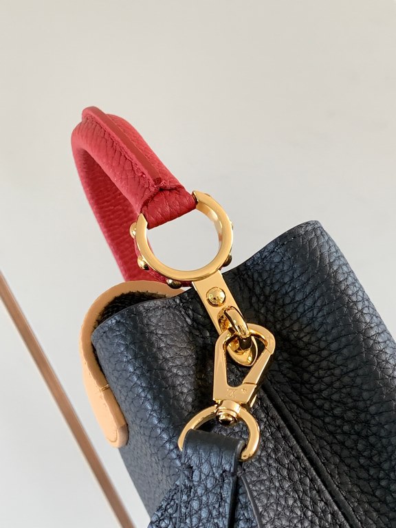 M59440 Black with Crimson Gold Buckle]This Capucines mini bag is crafted from grained cowhide leather and features a color-blocked body and top handle and flap, LV lettering for visual interest, and a wide, removable sho