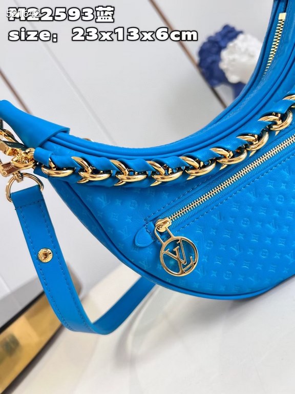 MM22593 BLUE] A Loop bag in cowhide leather with a miniature Monogram pattern. The colorful silkscreened LV monogram logo and Monogram floral pattern create a gentle contrast with the body of the bag. The chain and iconi