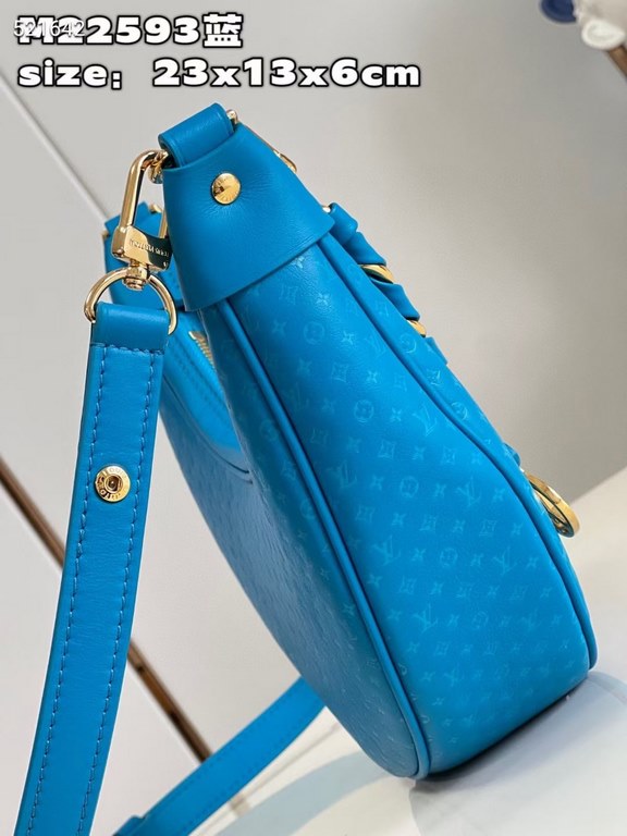 MM22593 BLUE] A Loop bag in cowhide leather with a miniature Monogram pattern. The colorful silkscreened LV monogram logo and Monogram floral pattern create a gentle contrast with the body of the bag. The chain and iconi