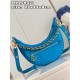 MM22593 BLUE] A Loop bag in cowhide leather with a miniature Monogram pattern. The colorful silkscreened LV monogram logo and Monogram floral pattern create a gentle contrast with the body of the bag. The chain and iconi