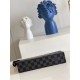 Top [Exclusive N64605] This Pochette Voyage clutch bag encounters the Louis Vuitton seal theme, depicting a wildlife rush in classic Damier Graphite canvas with passport stamp motifs, a tribute to the spirit of free trav