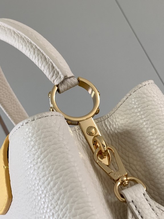 M59466 Pearl White with Pale Gold Buckle]A modern clash of shades in full-grain cowhide leather, this medium Capucines bag features the iconic LV alphabet and side loops, top handles and a detachable shoulder strap for v