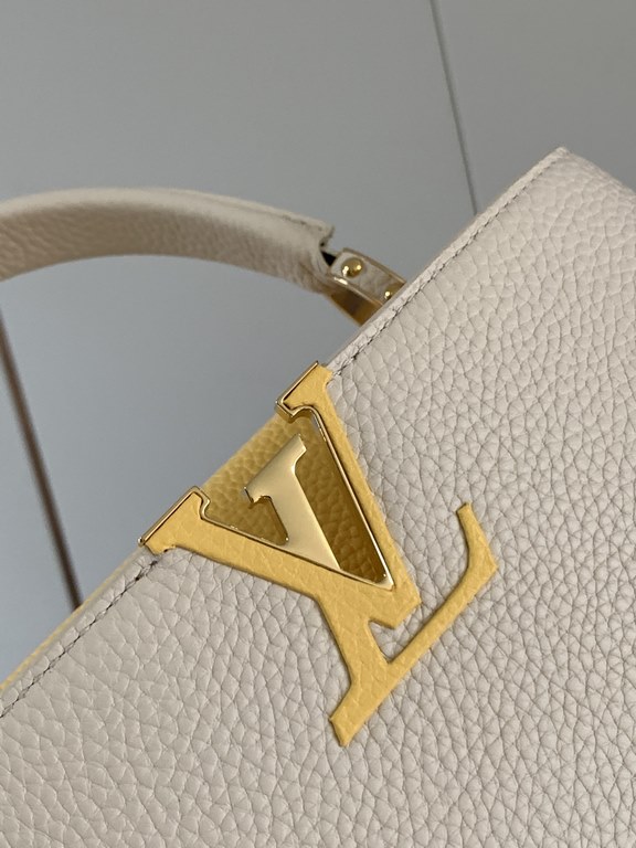 M59466 Pearl White with Pale Gold Buckle]A modern clash of shades in full-grain cowhide leather, this medium Capucines bag features the iconic LV alphabet and side loops, top handles and a detachable shoulder strap for v