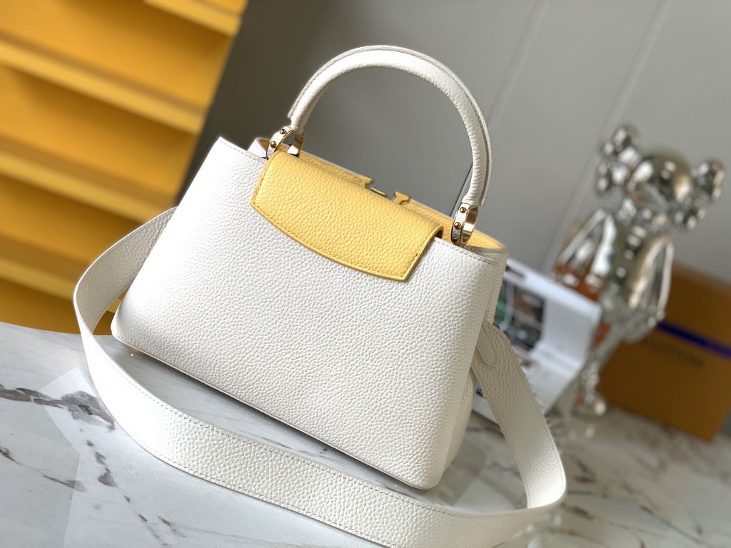 M59466 Pearl White with Pale Gold Buckle]A modern clash of shades in full-grain cowhide leather, this medium Capucines bag features the iconic LV alphabet and side loops, top handles and a detachable shoulder strap for v