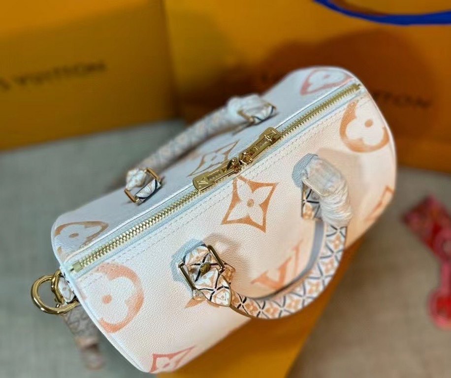 New in M23073 apricot, the Speedy Bandoulière 25 handbag is made of coated canvas with a pastel effect of the Giant Monogram pattern, and an intricate motif for the trim, handles, handle loops, and lining inspired by the