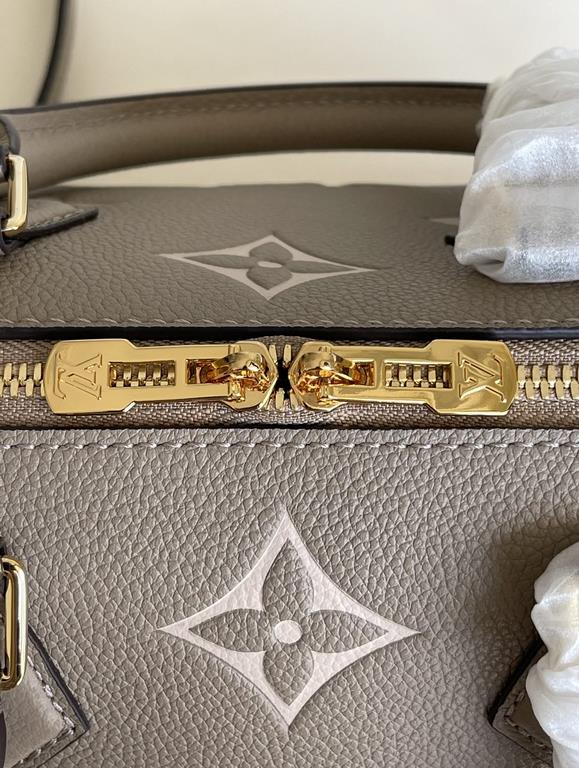 Exclusive to M58947] The Speedy Bandoulière 25 handbag from the Fall 2021 Wild at Heart capsule collection features oversized LV letters embossed in Monogram Empreinte leather and a detachable shoulder strap for a crossb