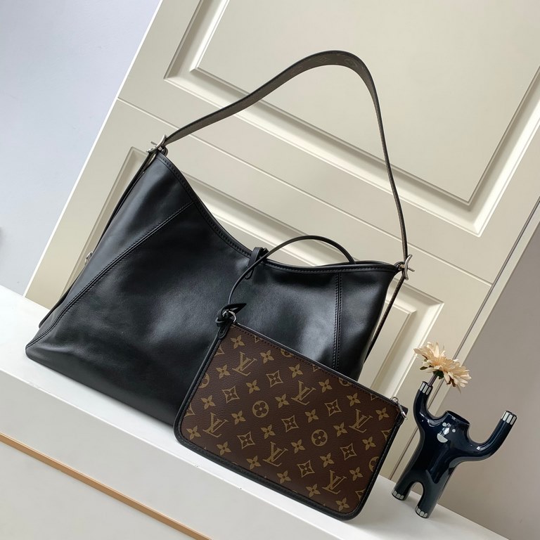 Top M25413 Black LeatherA sleek, slouchy silhouette in supple sheepskin, this CarryAll Dark medium bag added attention to the SpringSummer 2024 show looks. Polished metal pieces are complemented by a tactile, slightly wr