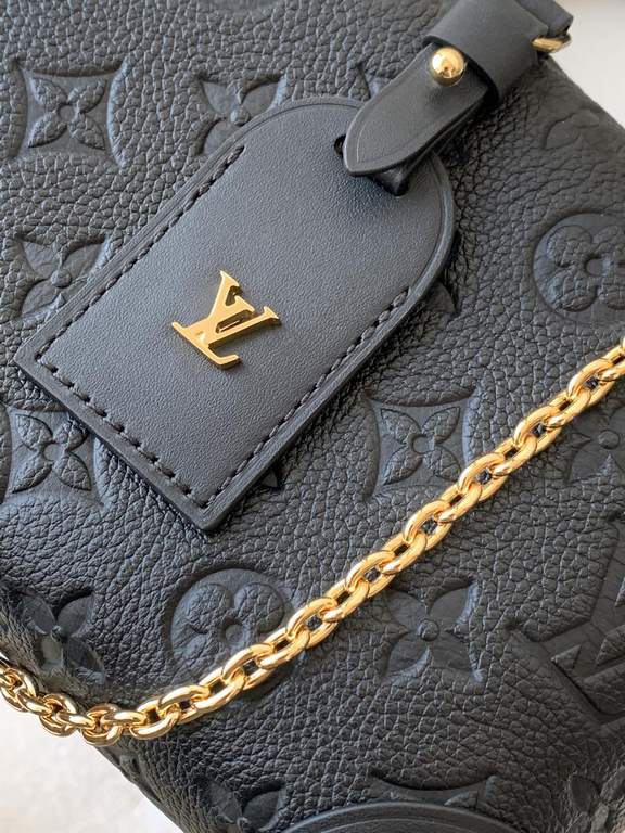 Top of the lineCrafted from embossed Monogram Empreinte leather, the Petite Malle Souple is a soft-sided version of the now iconic Petite Malle. Incorporating studded leather corners and a logoed leather luggage tag, it 