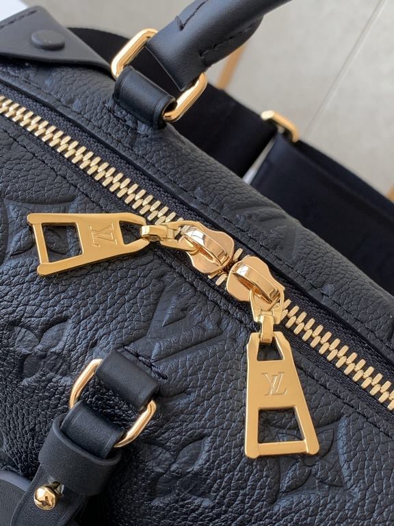 Top of the lineCrafted from embossed Monogram Empreinte leather, the Petite Malle Souple is a soft-sided version of the now iconic Petite Malle. Incorporating studded leather corners and a logoed leather luggage tag, it 