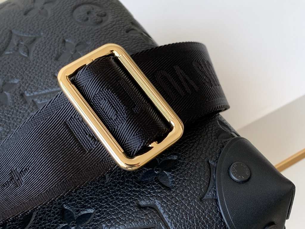 Top of the lineCrafted from embossed Monogram Empreinte leather, the Petite Malle Souple is a soft-sided version of the now iconic Petite Malle. Incorporating studded leather corners and a logoed leather luggage tag, it 