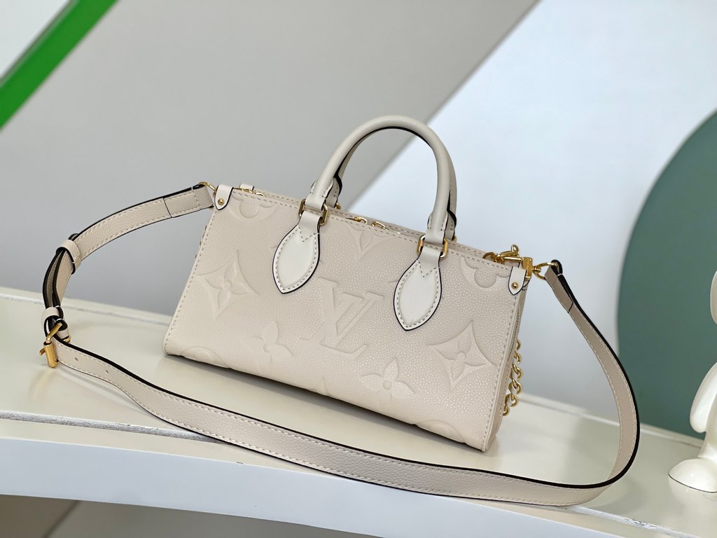 M23698 OnTheGo East West Handbag in Cream ColorIntroducing the Ays OnTheGo small tote bag design, the East West's ample shape is reinvented in Monogram Empreinte leather with a Giant Monogram embossed on the leather body