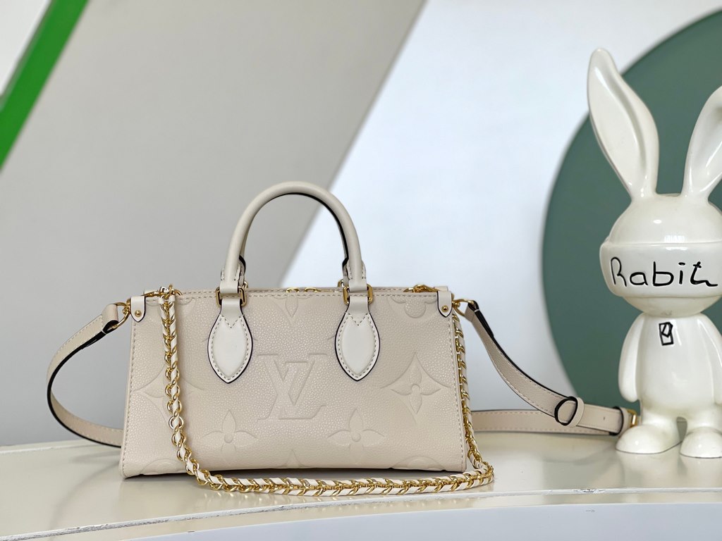 M23698 OnTheGo East West Handbag in Cream ColorIntroducing the Ays OnTheGo small tote bag design, the East West's ample shape is reinvented in Monogram Empreinte leather with a Giant Monogram embossed on the leather body