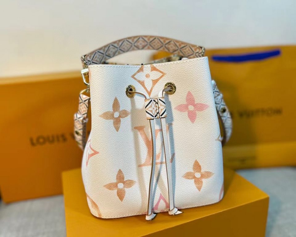 M22985 Apricot Bucket Bag Collection Seasonal New NéONOé BB Handbags This NeoNoé bucket bag is made of muted canvas depicting the Giant Monogram print, which gives shades of watercolor to the LV and Monogram florals, and