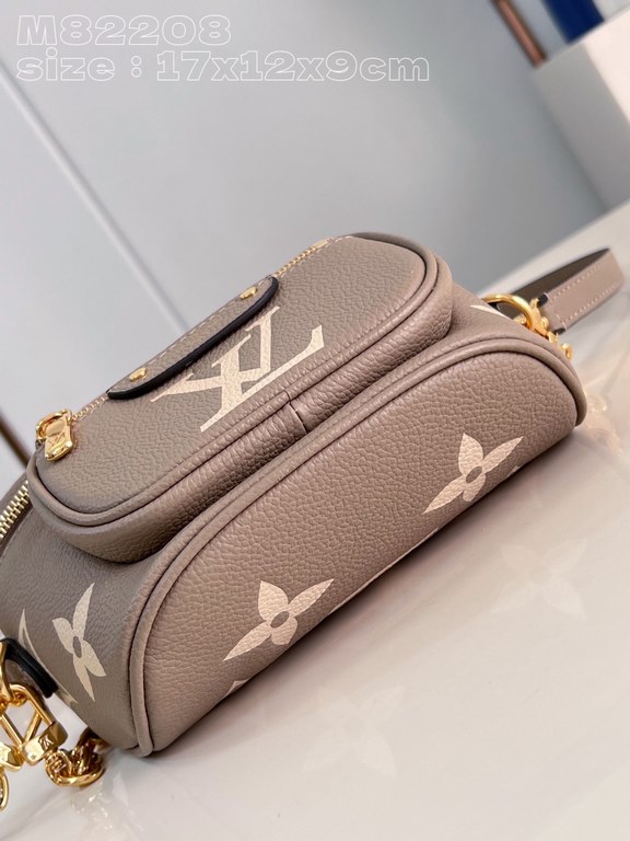 Exclusive M82208 silk-screened in light gray] Louis Vuitton's soft take on the trendy fanny pack design, the Mini Bumbag is crafted from Monogram Empreinte leather and features a zippered main compartment and zippered po