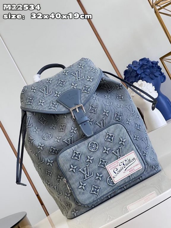 Exclusive M22534 】Montsouris shoulder bag with Monogram pattern embossed on faded denim, a personalized alternative to the classic design. The drawstring closure gives it a soft shape and the vintage label is from the br