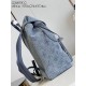 Exclusive M22534 】Montsouris shoulder bag with Monogram pattern embossed on faded denim, a personalized alternative to the classic design. The drawstring closure gives it a soft shape and the vintage label is from the br